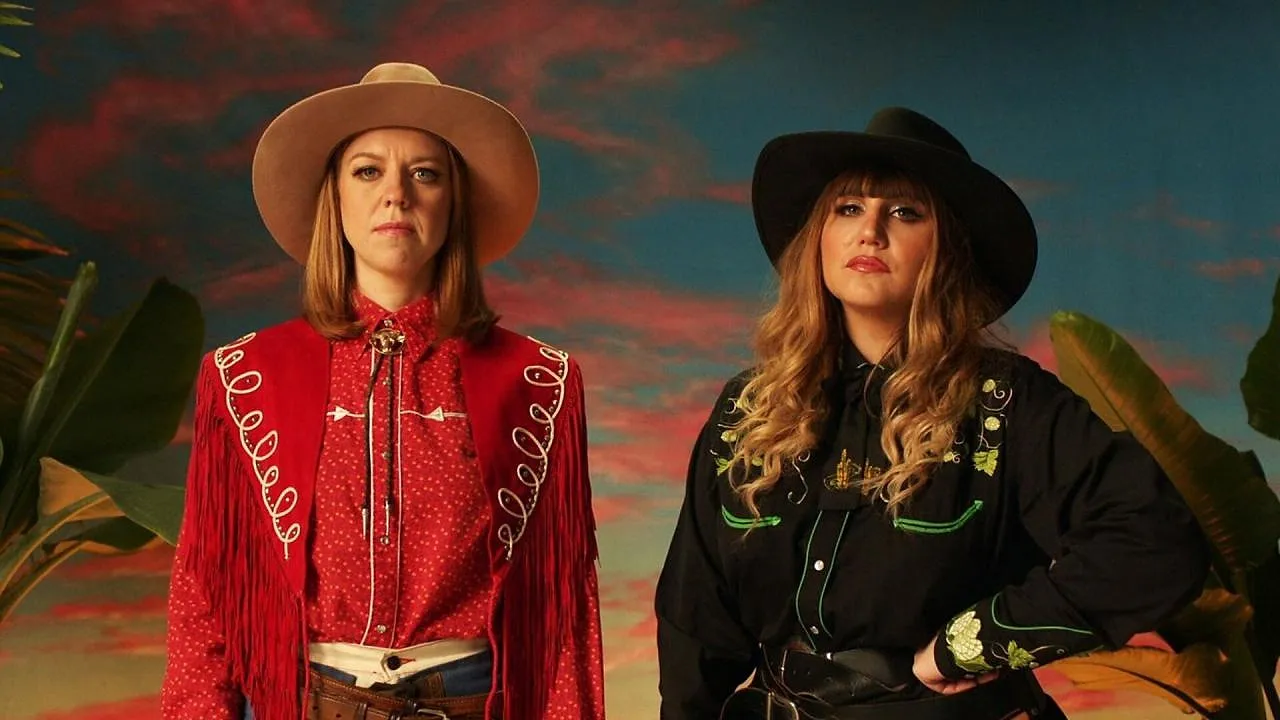 Signed: Ellie & Natasia